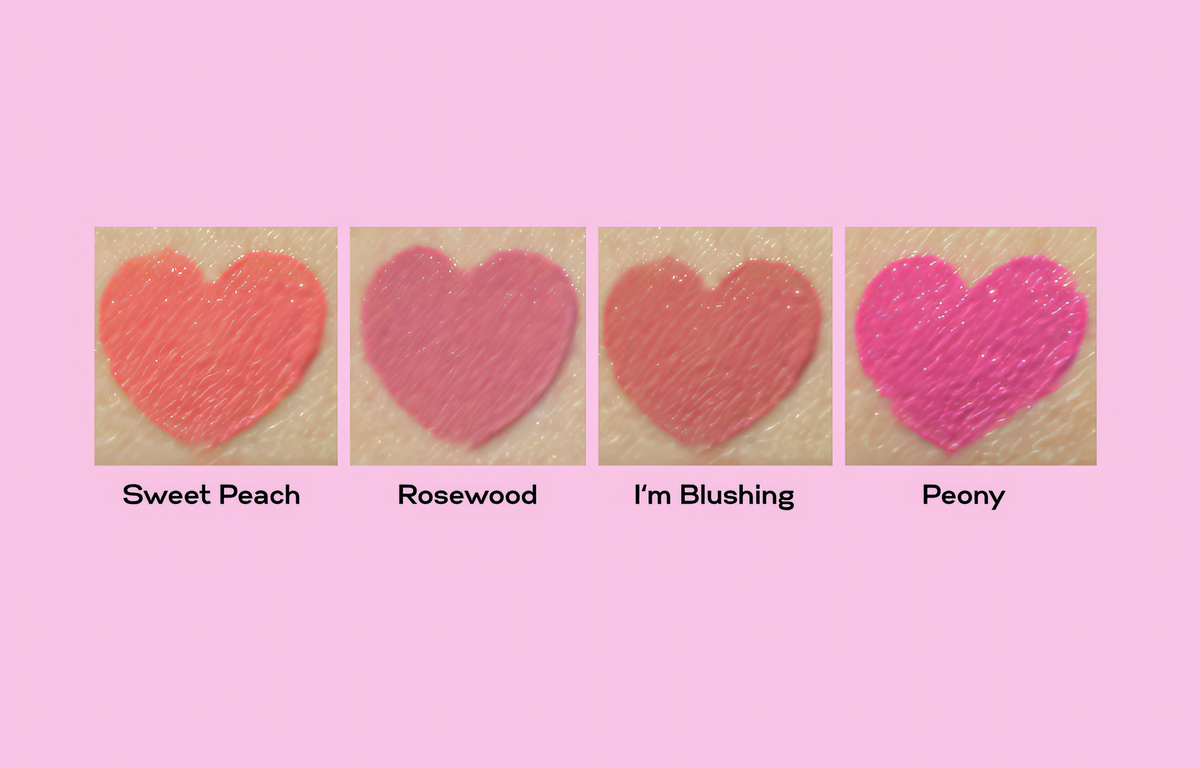 Four heart-shaped cosmetic swatches on a pink background, labeled Sweet Peach, Rosewood, I'm Blushing, and Peony.