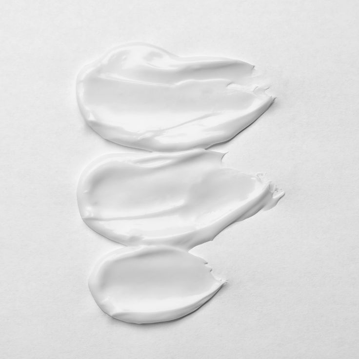 Signature Skincare Trio texture swatches, three smears of white cream – Victoria London