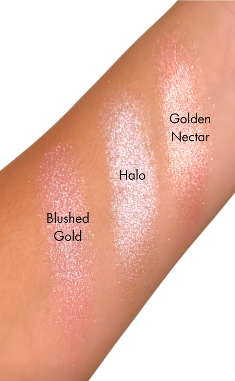 Luminous Highlighter swatches on skin in Blushed Gold, Halo and Golden Nectar – Victoria London