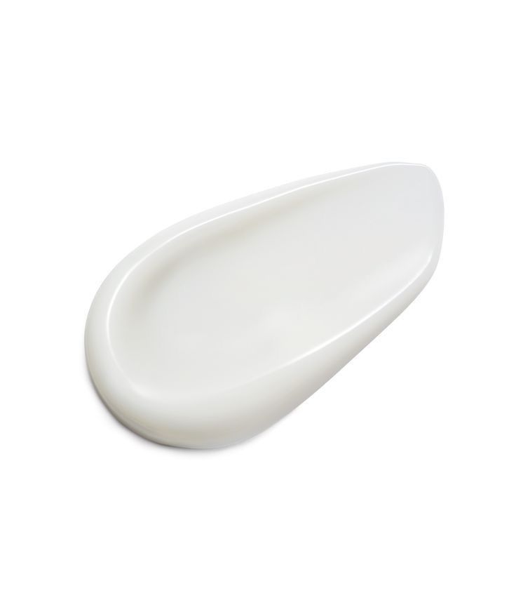 White teardrop-shaped ceramic plate on a white background