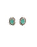 A pair of oval stud earrings featuring light green jade-like centers surrounded by small clear stones in a gold-tone halo setting, shown on a plain white background.