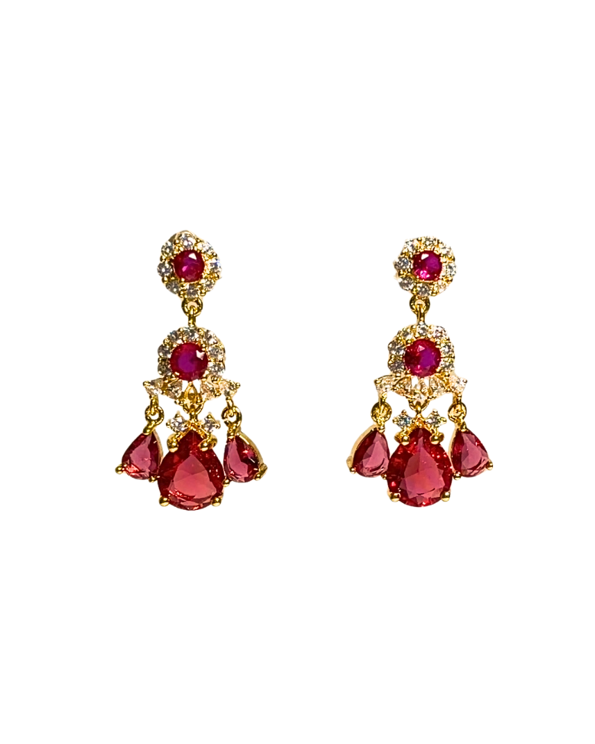 The Royal Ruby Chandelier Statement Earrings with crimson pear-shaped drops and gold-tone crystal frames – Victoria London