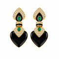 Vintage-inspired black enamel heart drop earrings with emerald-green cabochons and pavé gold-tone borders – Victoria London