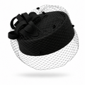 Classic black felt pillbox fascinator hat with looped sculptural bow and dotted birdcage veil – Victoria London
