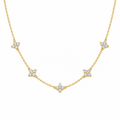 Delicate floral cluster station necklace in gold tone with crystal four-petal flowers on a fine chain – Victoria London