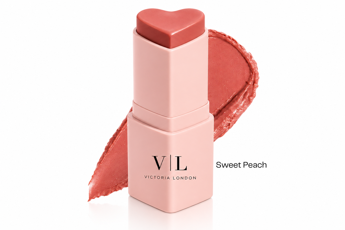 Heart You Beauty Balm in Sweet Peach, a peach-pink heart-shaped bullet with a colour swipe – Victoria London