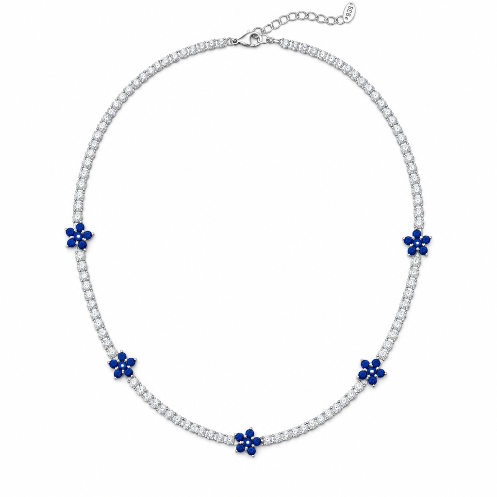 Midnight blue floral crystal tennis necklace, a clear crystal strand with sapphire-blue flower accents – Victoria London