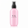 Oil-Control Setting Spray in a pink bottle with black spray nozzle and VL logo – Victoria London
