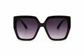 Oversized black hexagonal sunglasses with a high-shine frame and dark gradient lenses – Victoria London