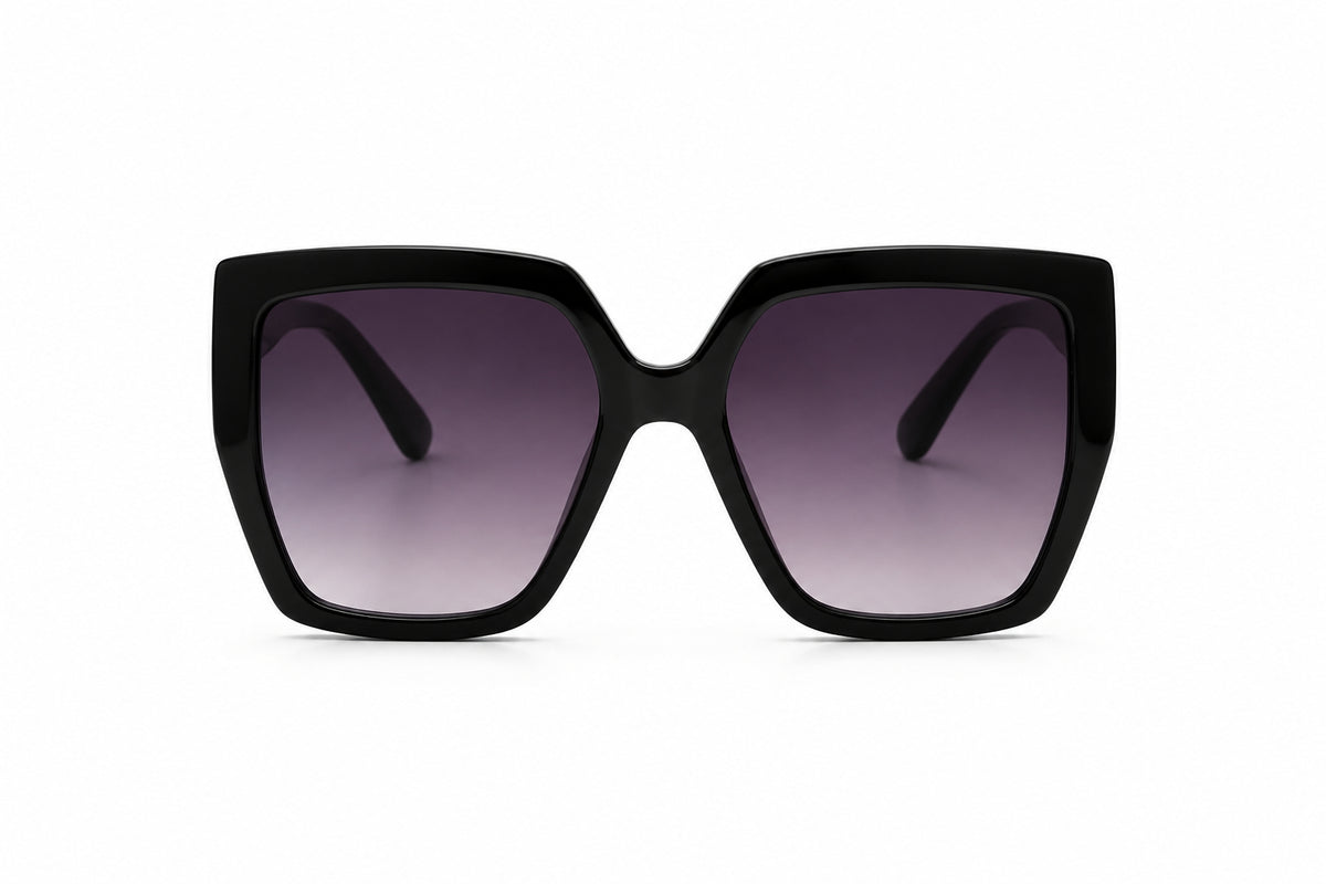 Oversized black hexagonal sunglasses with a high-shine frame and dark gradient lenses – Victoria London