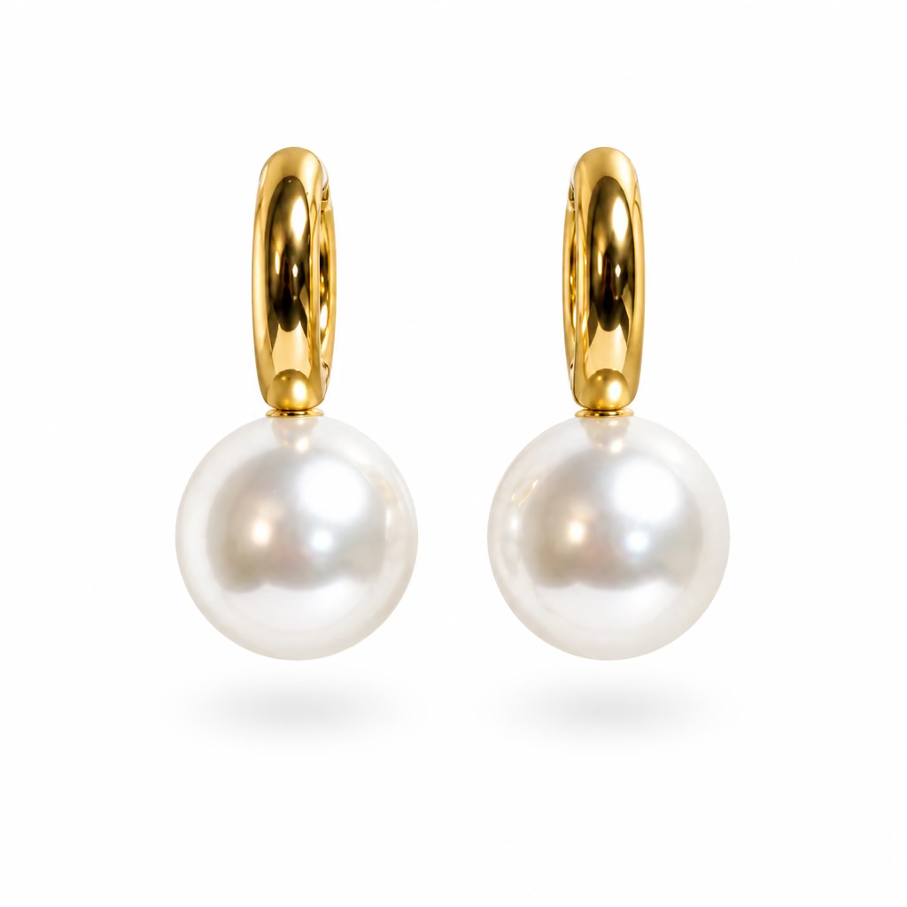 The Atelier gold huggie earrings with large round statement pearl drops – Victoria London