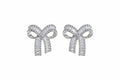 The Crystal Baguette Bow Earrings in silver tone with channel-set baguette crystals and pavé trim – Victoria London