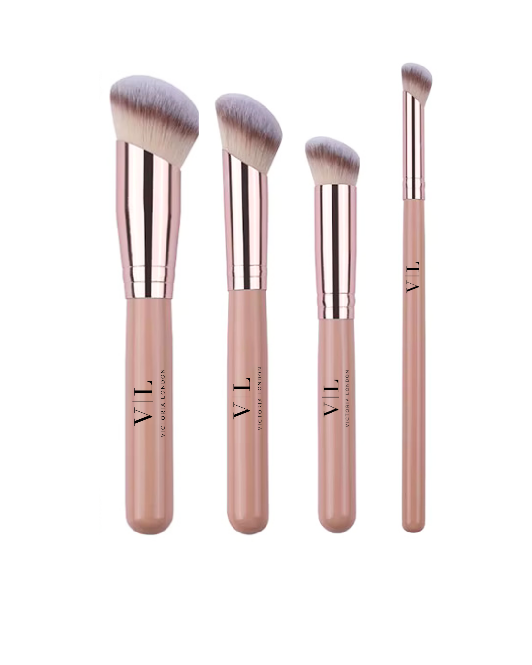 The Sculpted Glow Brush Collection, four angled brushes with blush pink handles and rose-gold ferrules – Victoria London